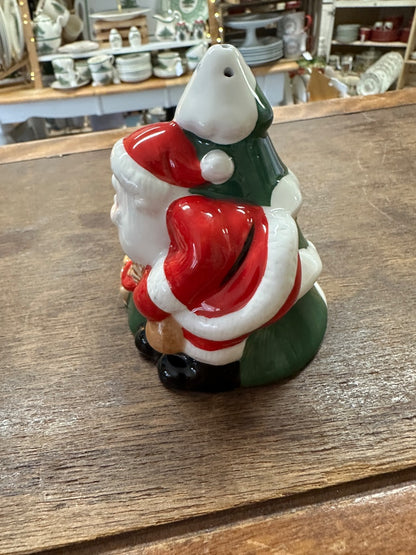 Ceramic Christmas salt shaker with reindeer and santa in red hat on green tree