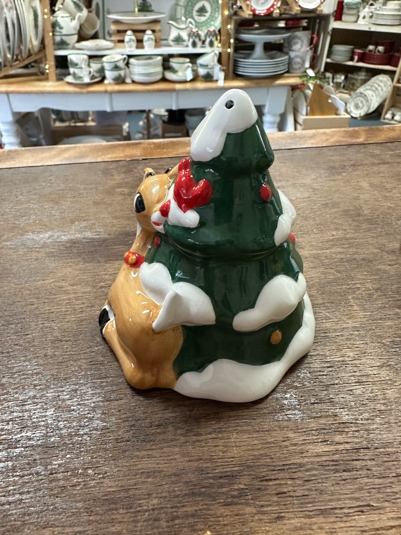 Ceramic Christmas salt and pepper shakers with reindeer holding santa figure