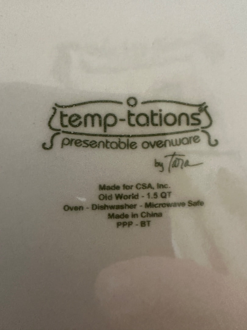 White ceramic lid underside with temp-tations branding and oven-safe markings