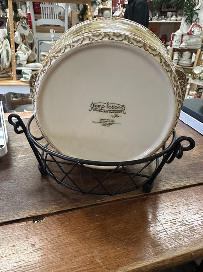 Bottom of white and brown baking dish on metal wire rack