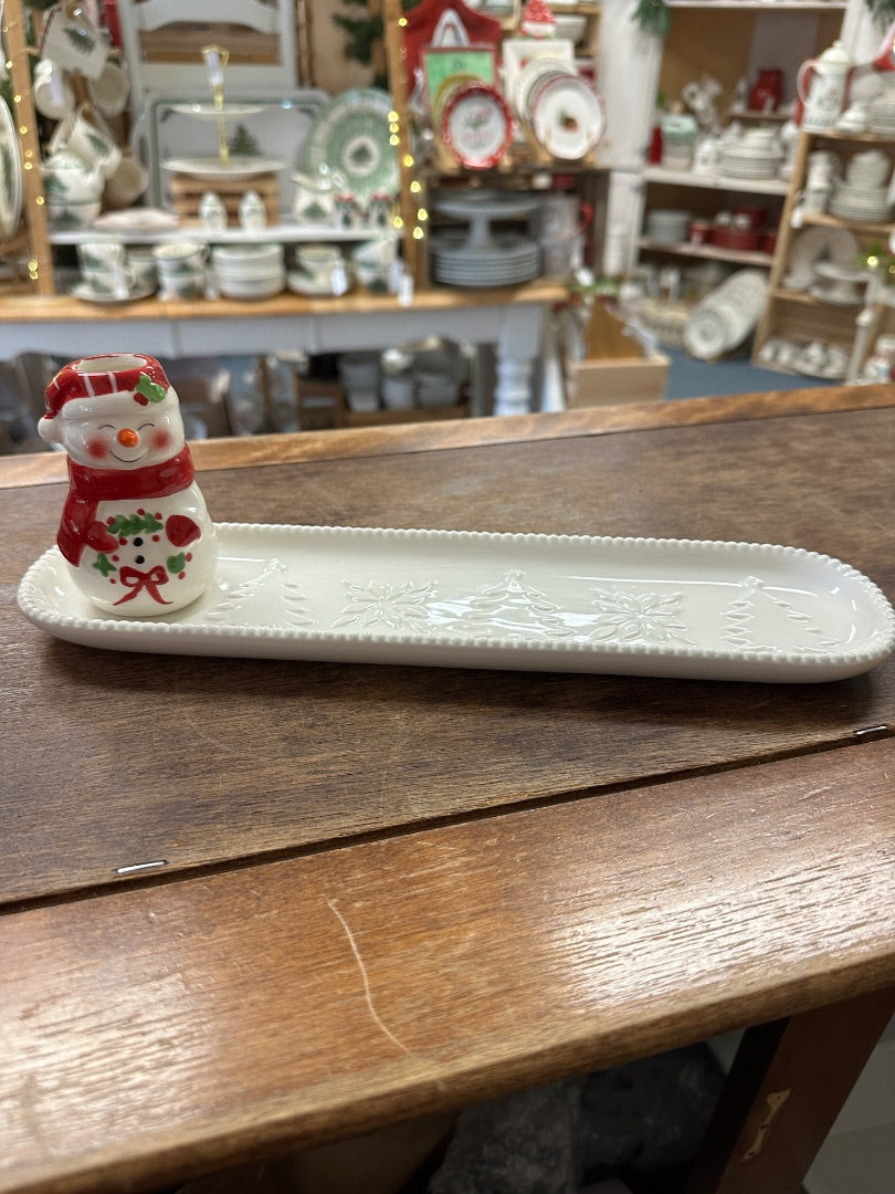 White oval holiday tray with embossed snowflake pattern and snowman toothpick holder