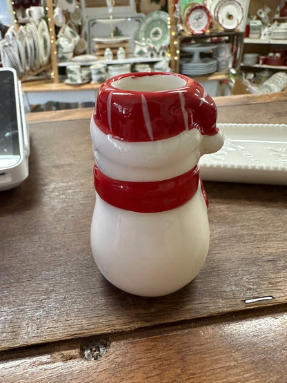 White holiday tray with embossed pattern and red-and-white Santa-style snowman toothpick holder