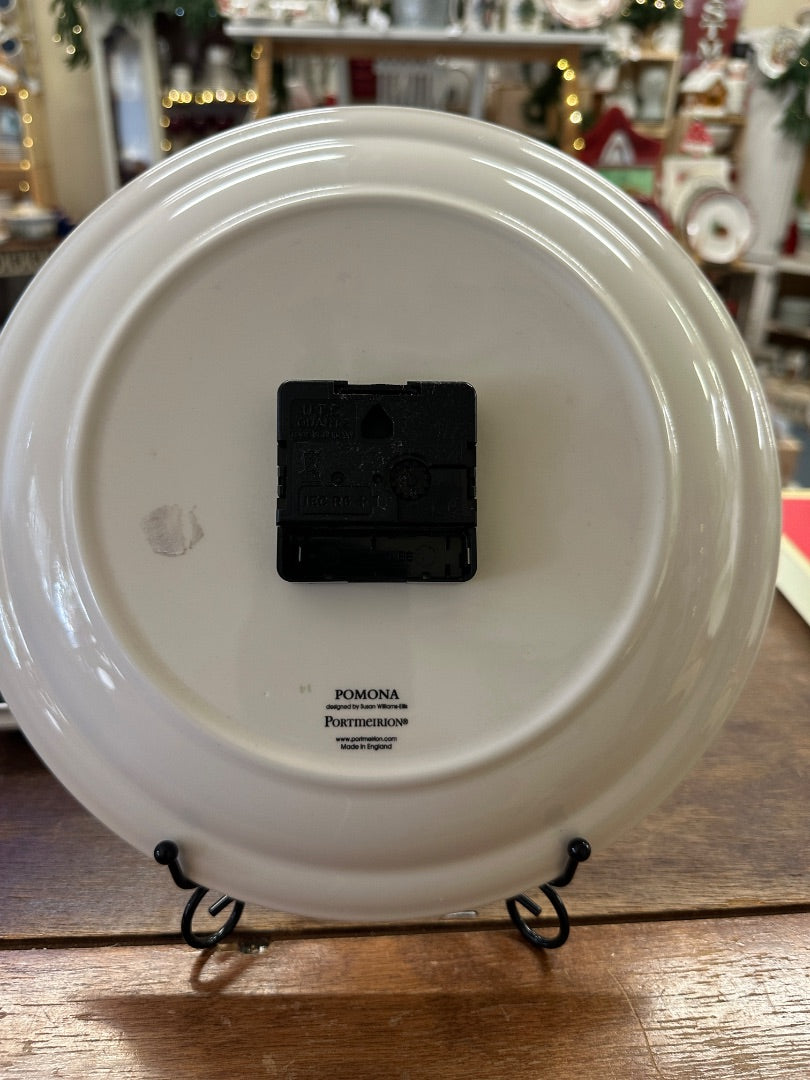 Porcelain clock back with Pomona branding and a black mounting label