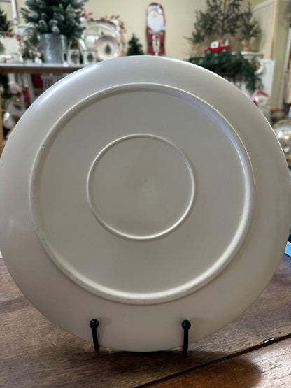 White decorative plate, plain back with circular raised center and display stand