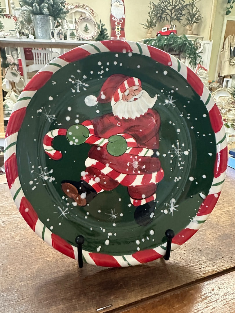 Christmas decorative plate with Santa illustration, red green border pattern on display stand