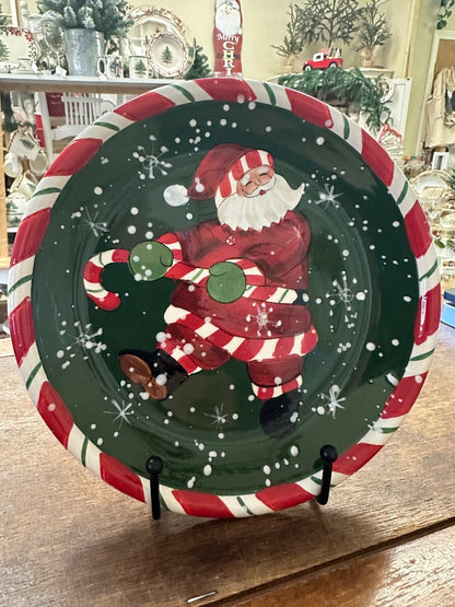 Christmas decorative plate with Santa illustration, red green border pattern on display stand