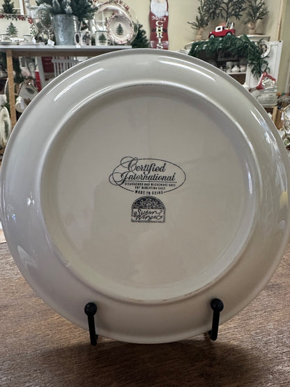 White ceramic plate back with Certified International logo and made in China stamp