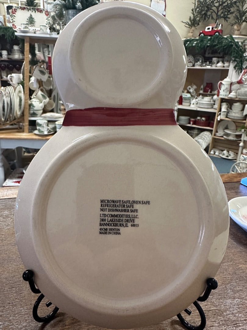 Snowman ceramic plate, underside view with microwave-safe text