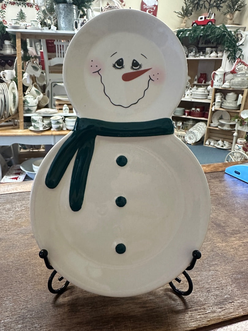 Snowman decorative plate with green scarf and black button details