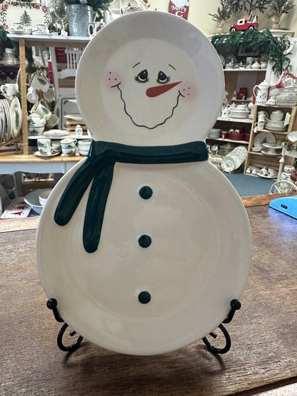 Snowman decorative plate with green scarf and black button details