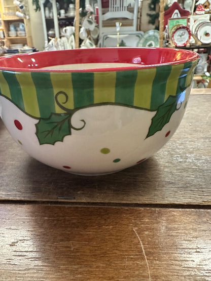 Decorative ceramic mixing bowl with green holly stripe band and red rim