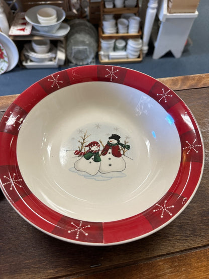Red holiday serving bowl with snowman center design and red star rim