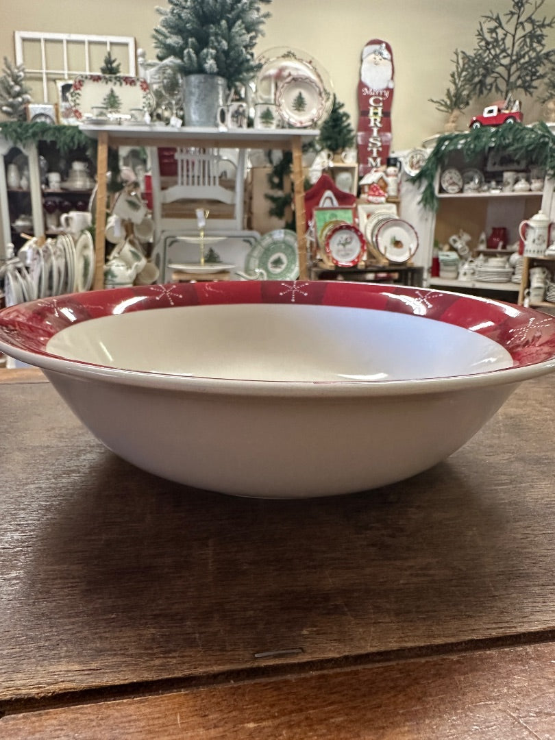 White serving bowl with glossy red outer rim and wide shallow interior