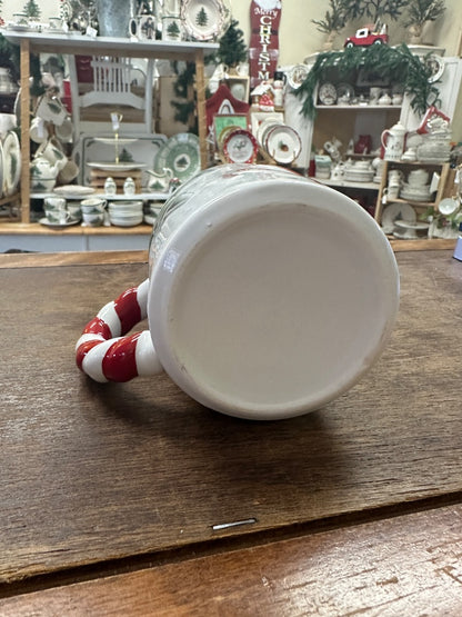 White Christmas mug interior and rim with red-striped handle