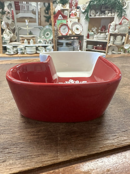 Red and white ceramic stocking-shaped bowl, front view with glossy finish