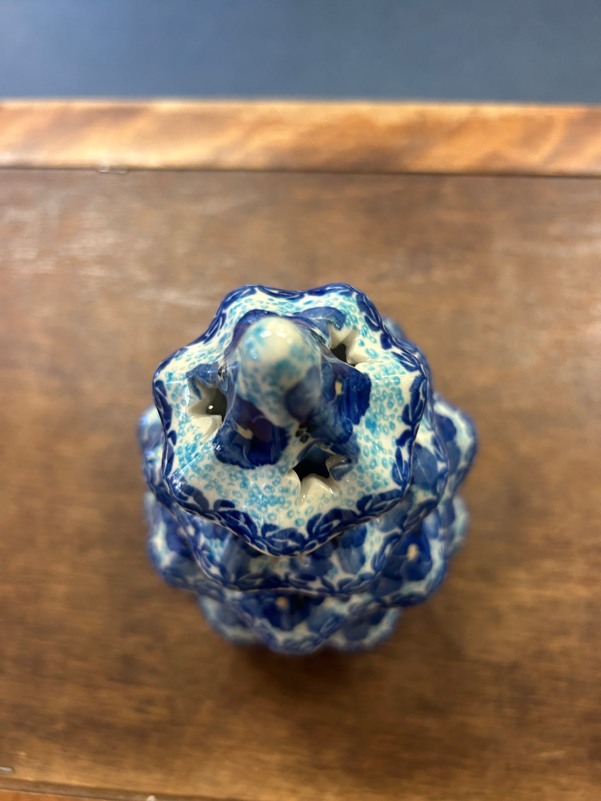 Blue glazed ceramic tree luminary on matching round plate