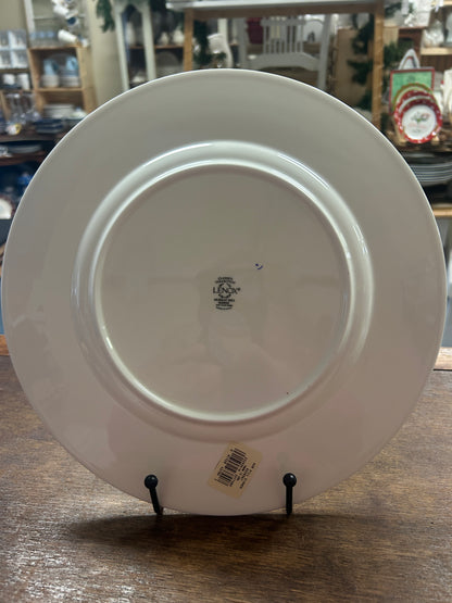 White ceramic dinner plate underside with maker stamp and barcode label