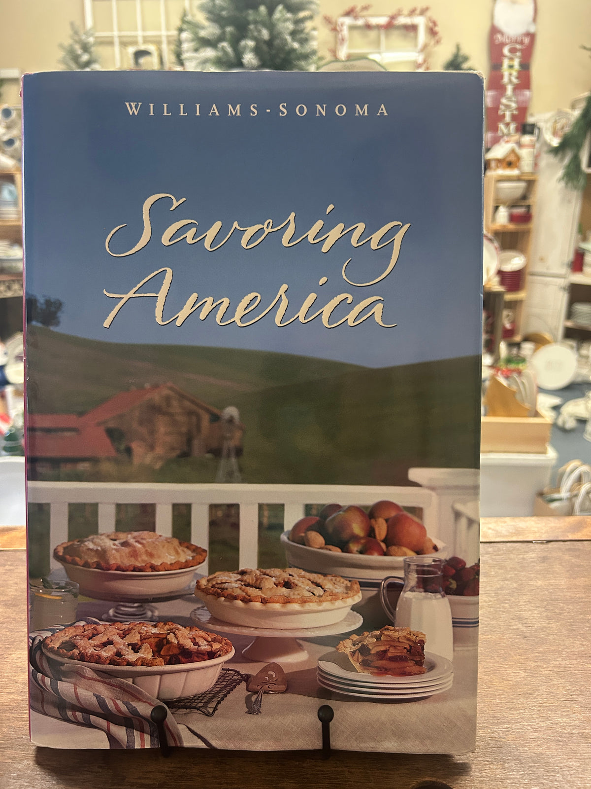 Cookbook cover titled “Savoring America” with baked dish photos