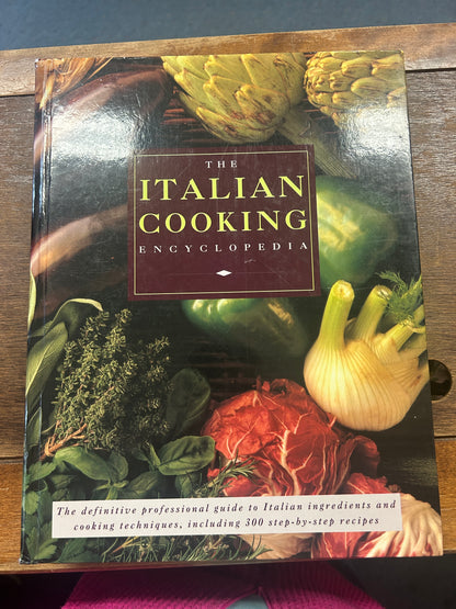 Hermes Italian cooking encyclopedia book cover with colorful food illustrations and title