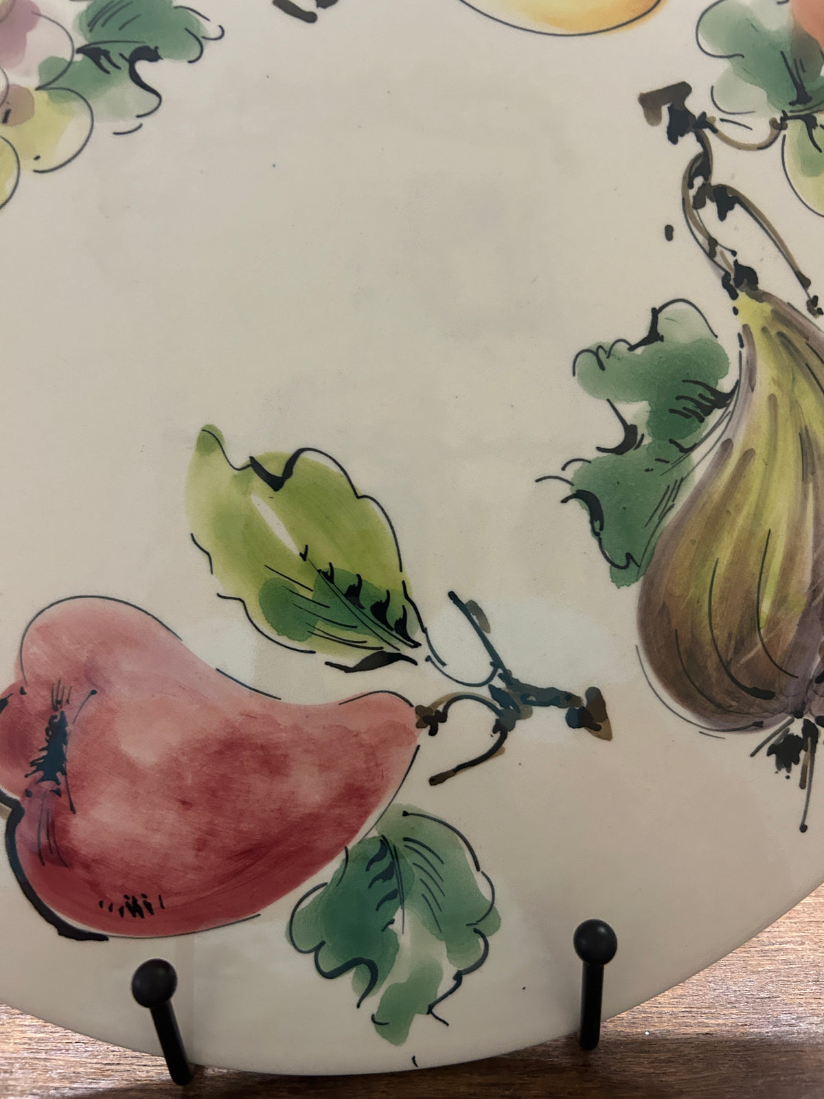 Decorative 12-inch fruit platter with green leaves, pears, and eggplant illustrations