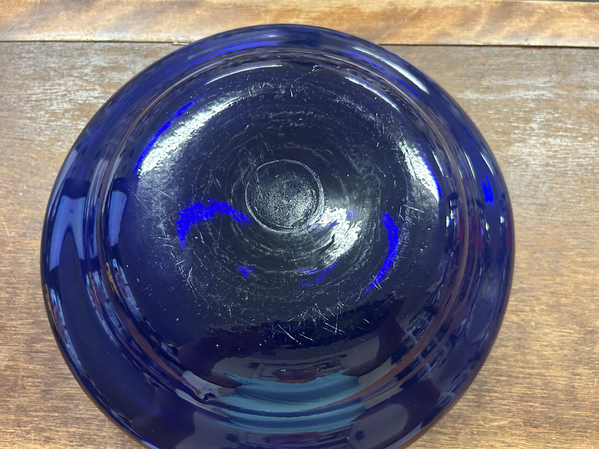 Cobalt blue bowl underside with circular foot and glossy glass finish