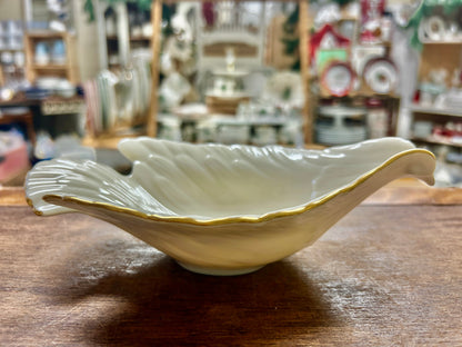 Cream Lenox dove bird bowl with gold rim, scalloped dish shape.
