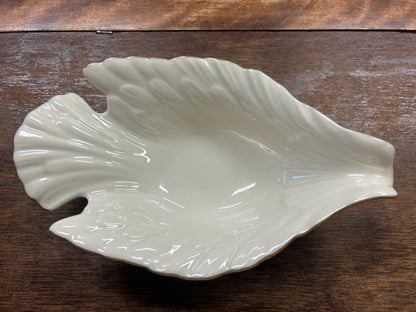 Cream Lenox dove-shaped serving bowl with gold edge detailing.
