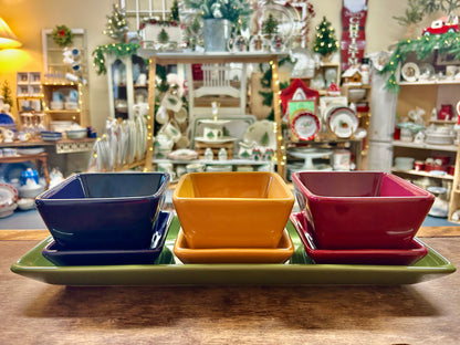 Pampered Chef multicolor additions set: three square dishes (navy, orange, pink) on green tray