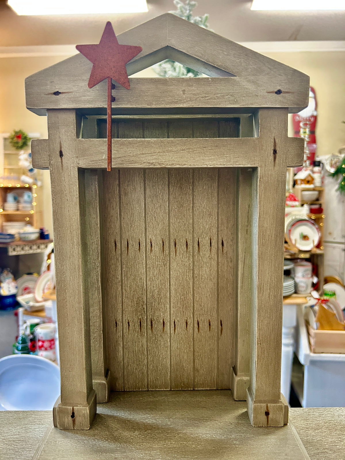 Wooden nativity creche base with arched door opening, red star topper, and legs, 20-inch