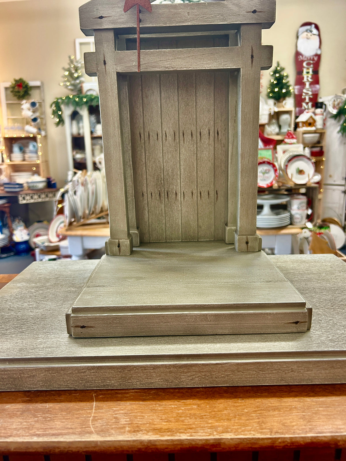 Wooden creche base front with arched door and red star on roof, plus flat base, 20-inch