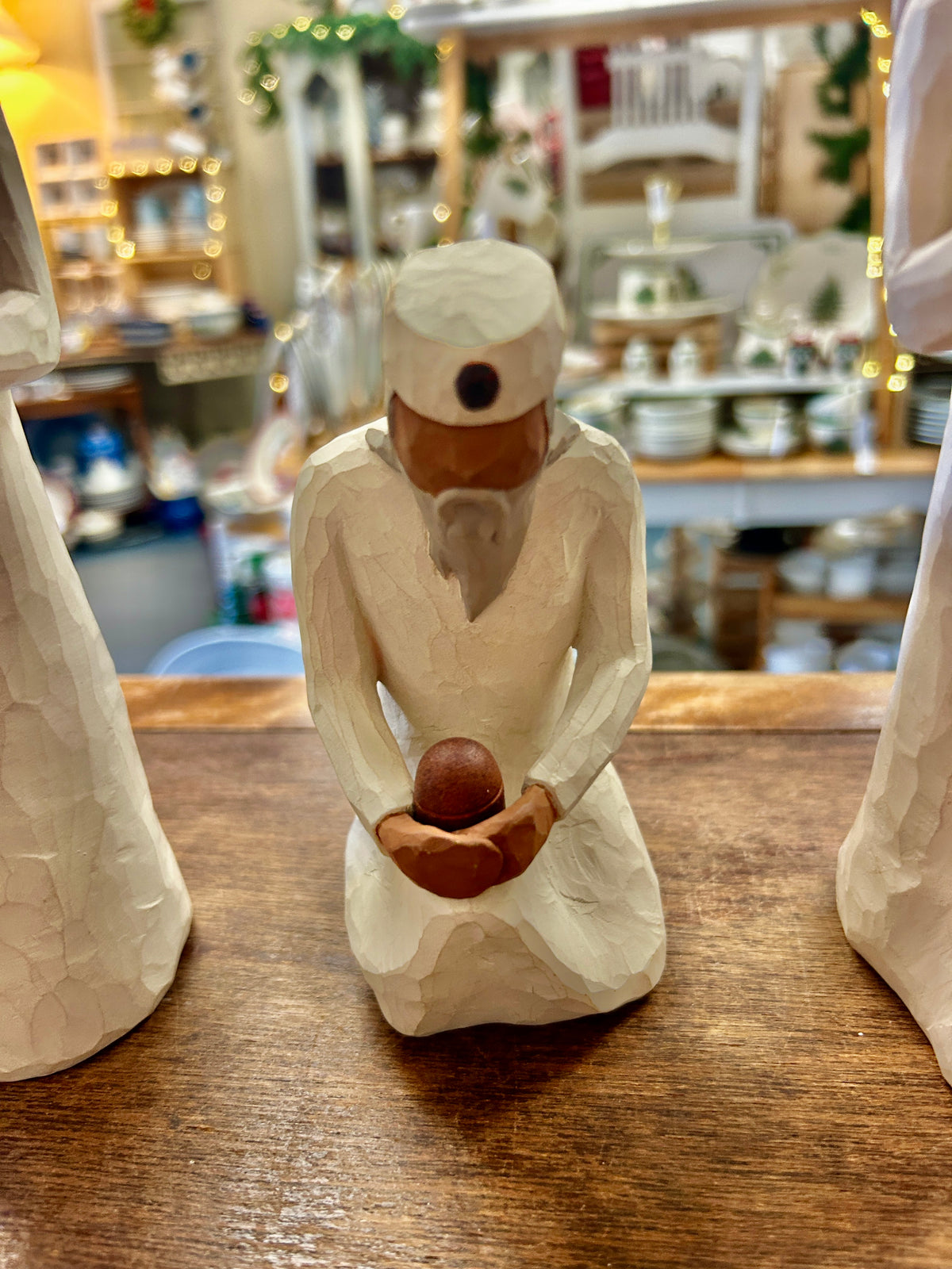 Cream Willow Tree kneeling wise man nativity figurine, hands holding a brown book