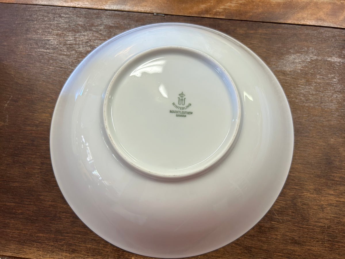 White serving bowl base with brand mark in center and glossy finish