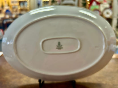 White oval platter base with leaf stamp and oval recess