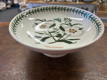 Ceramic footed bowl with botanical bird and green leaf rim
