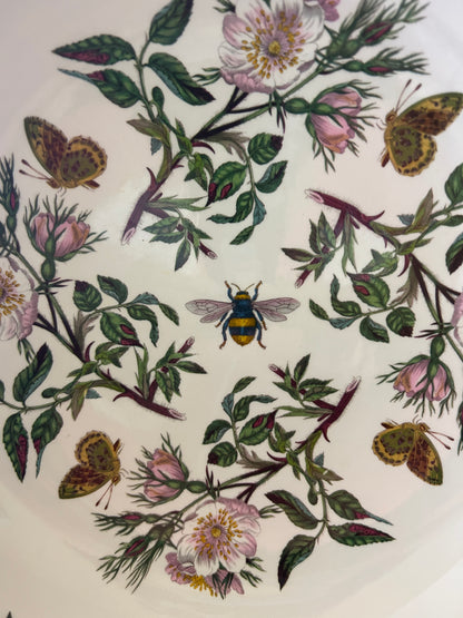 Botanic Garden serving bowl pattern view with pink flowers, green leaves, butterflies