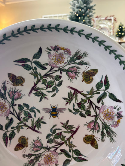 Botanic Garden serving bowl with centered floral-and-butterfly design and green rim