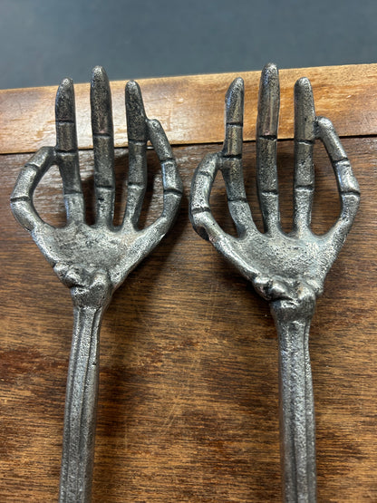 Silver skeleton hand forks, 2 pcs, detailed palm with raised finger tines.