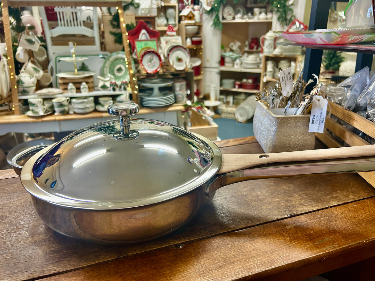 Stainless steel skillet with lid and long wooden handle