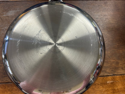 Stainless steel lid with Our Place logo on top