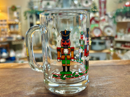Christmas nutcracker glass mug with colorful nutcracker figure and star details