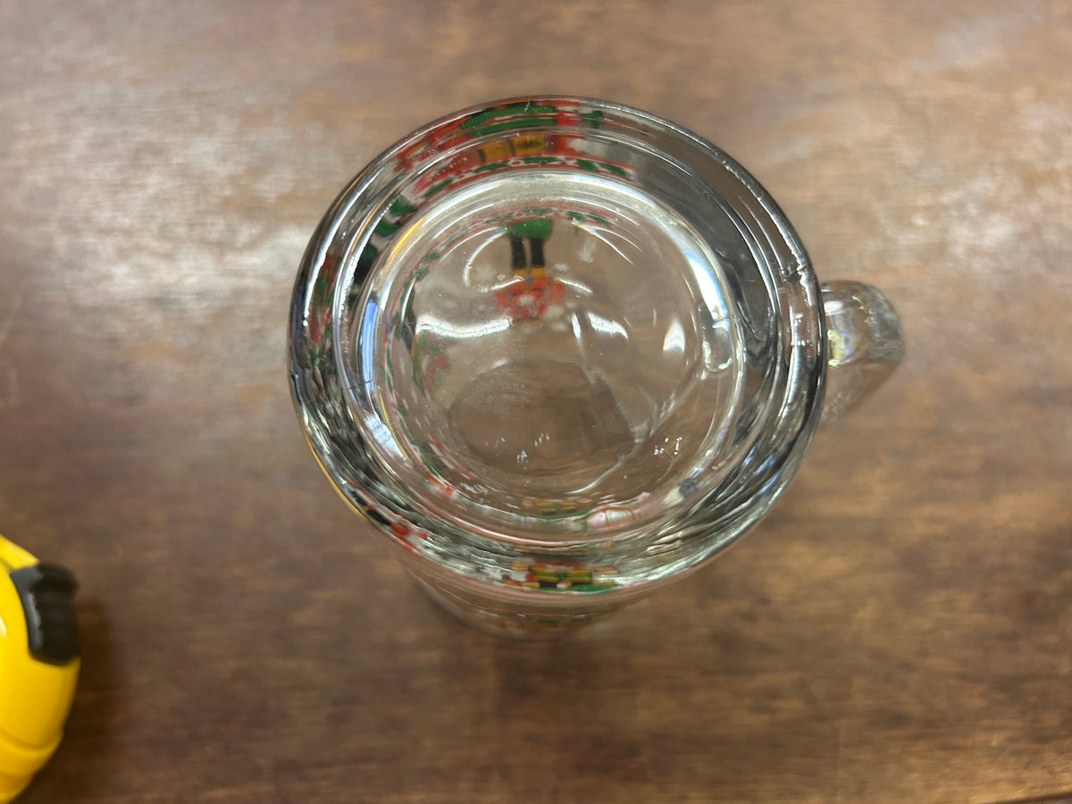 Empty glass mug interior viewed from above, showing clear rounded base