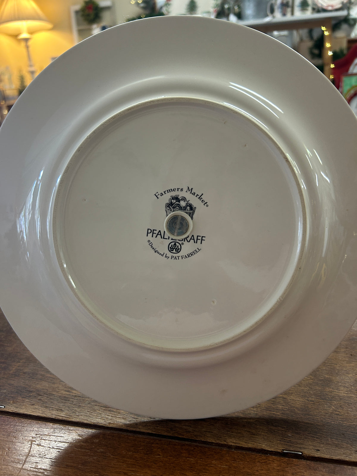 Bottom of ceramic plate with Farmers Market Pfaltzgraff brand mark