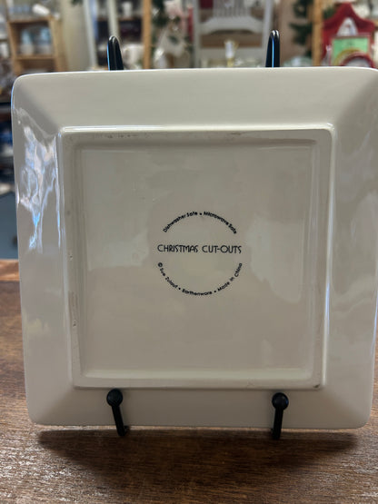 White square plate with recessed back and circular “CHRISTMAS CUT-OUTS” text