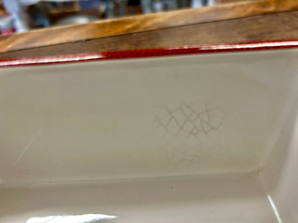 Close-up of white ceramic interior with subtle etched lines