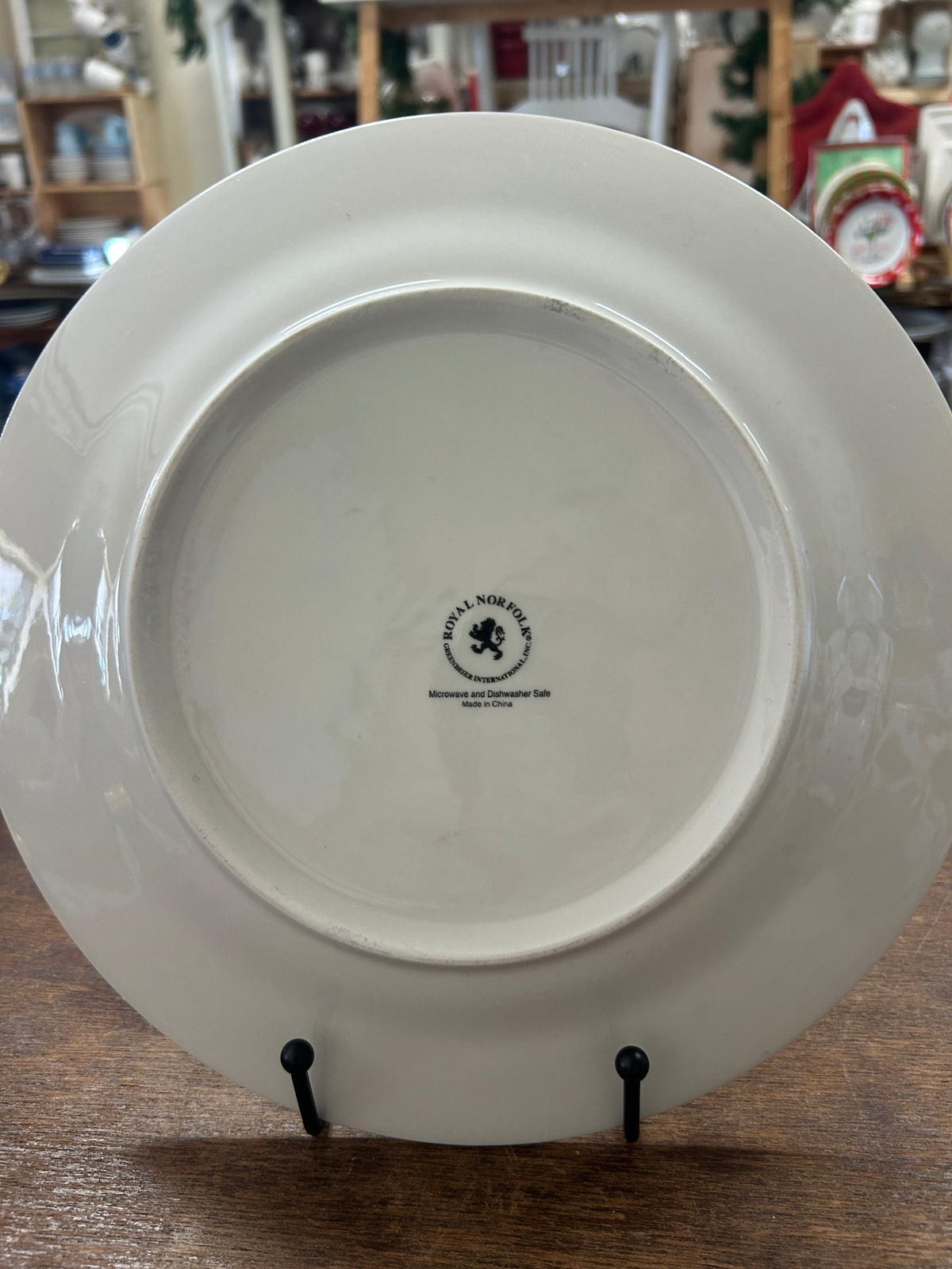 White dinner plate underside with Royal Norfolk logo stamp