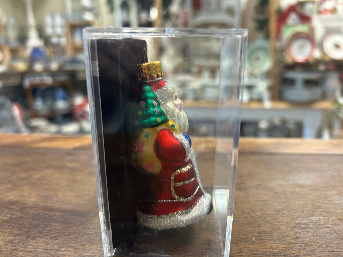 Santa Claus glass ornament side view in clear box, colorful glitter suit and hat