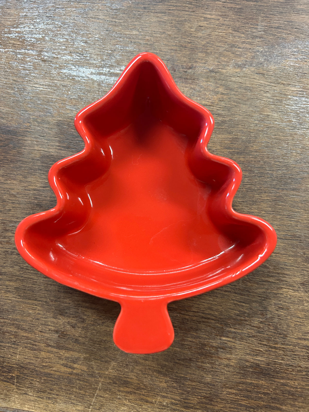 Red tree-shaped Stonewall Kitchen bowl with raised rim and small center foot