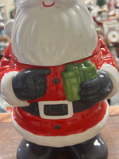Santa cookie jar torso detail, red suit with green belt and black boots