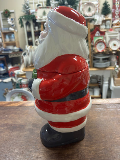 Santa cookie jar side view, white beard and red hat over red-and-white stripes
