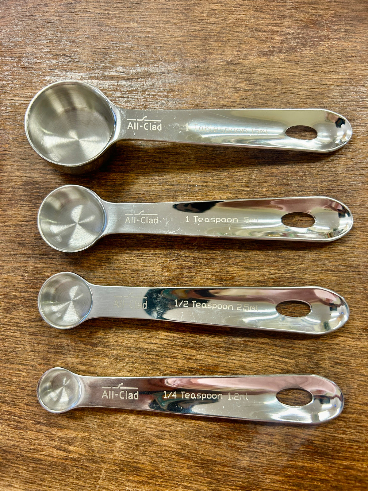 All-Clad stainless measuring spoon set with 1, 1/2, 1/4 teaspoon markings